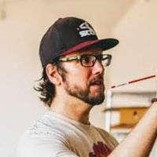 Kenneth Patrick Schweiger. White male with beard wearing glasses & baseball cap
